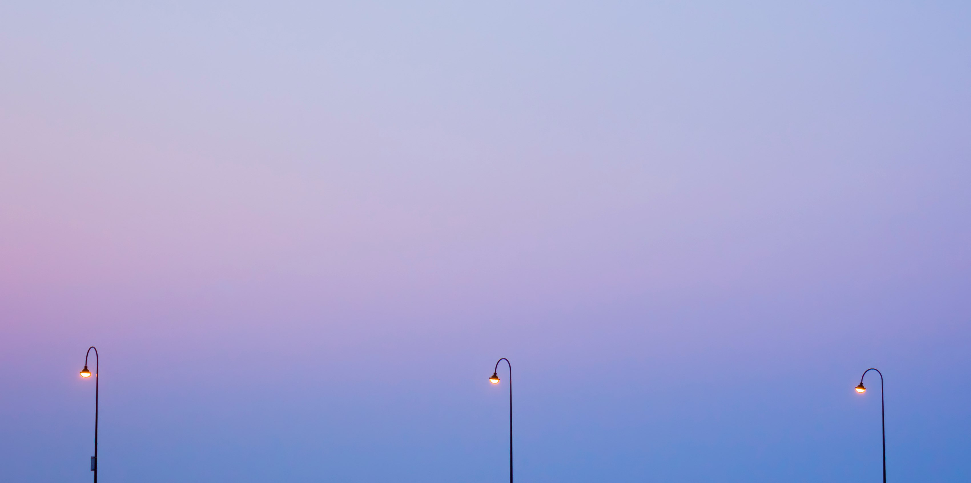 turned-on three light posts wallpaper